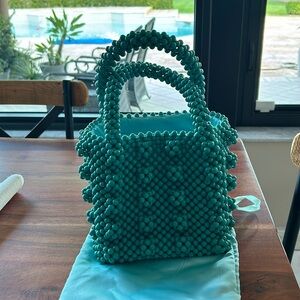 Beaded aqua small purse.